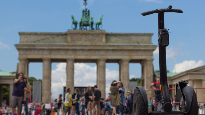 segway and people at brandenburg gate, Berlin