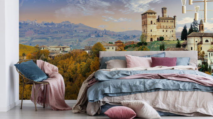Pastel pink, beige and blue bedding on king size bed in trendy b
