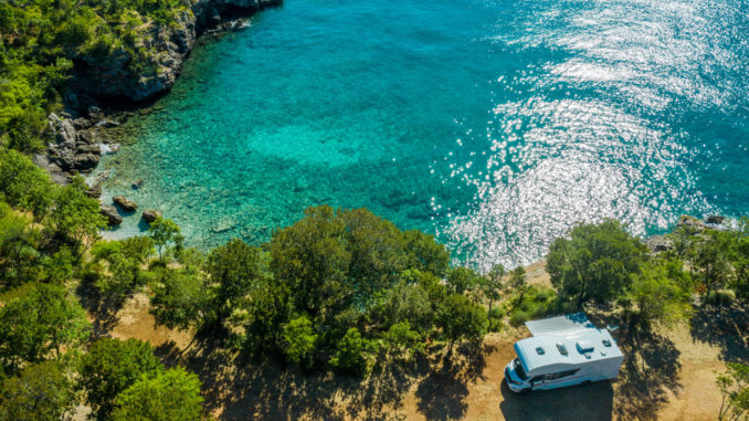 Aerial,Photo,Of,Scenic,Sea,Front,Rv,Campsite.,Modern,Motorhome