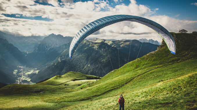 Paraglider,In,The,Mountains.,Paragliding,In,The,Dolomites.,Paragliding,In