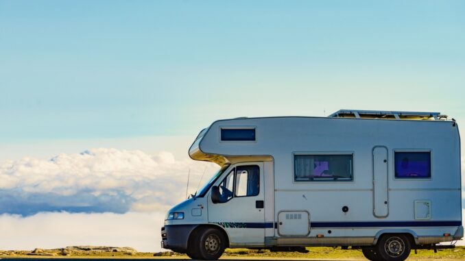 Caravan,Rv,Above,Clouds.,Motor,Home,Camping,Car,In,Mountain